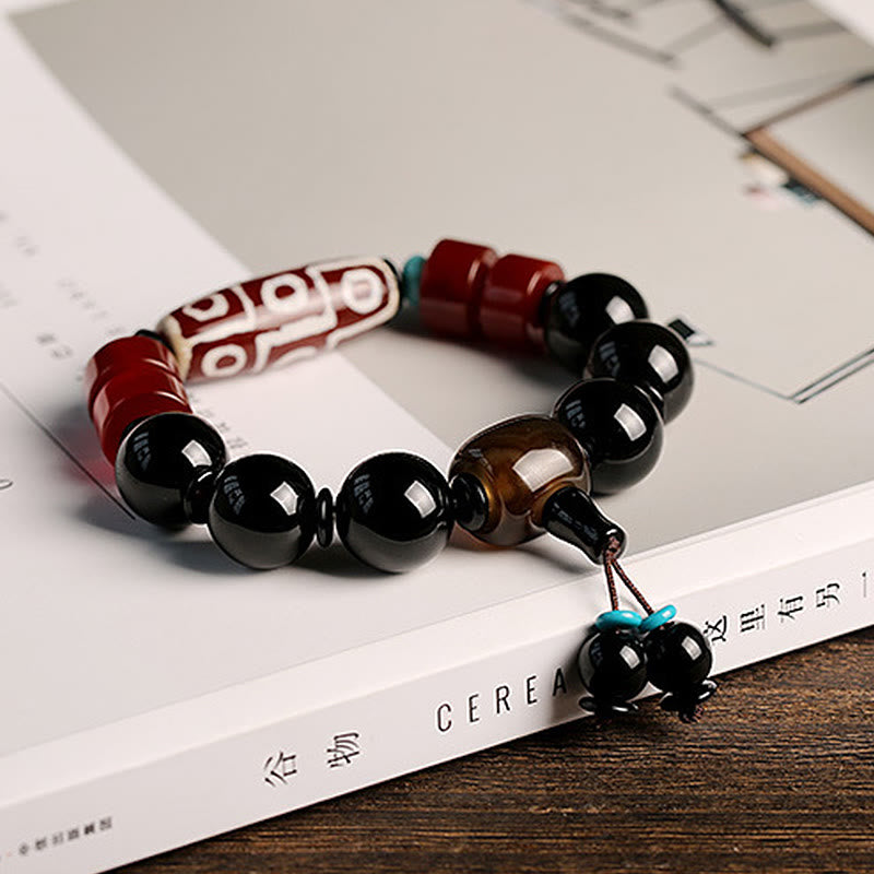 Tibetan Nine-Eye Dzi Bead and Polished Black Onyx Natural Stone Bracelet