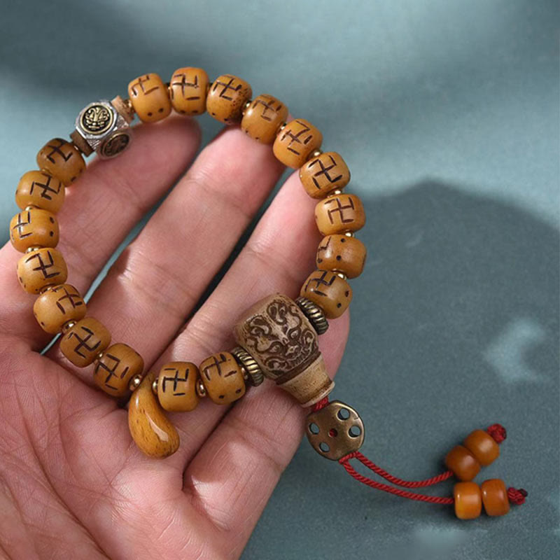 Natural Tibetan Camel Bone Bracelet with Dzi Bead, Shankha, or Kirtimukha Charms