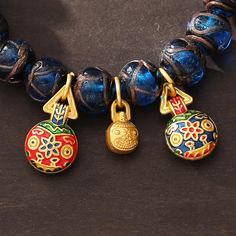 Handcrafted Blue Liuli Glass Bead Bracelet with Gold and Copper Pixiu Focal