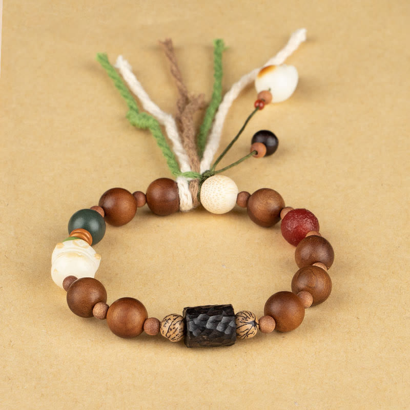 Lightning Struck Wood & Bodhi Seed Cat Paw Tassel Bracelet with Red Agate and Onyx