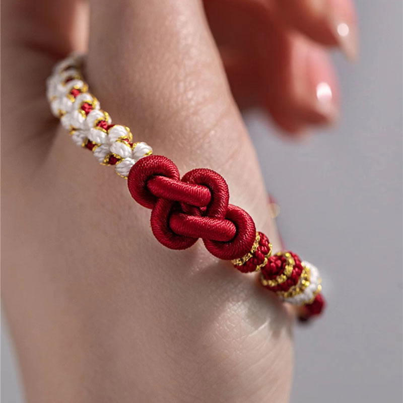Hand-Braided Red String Bracelet with Copper Endless Knot & Peach Blossom Charm