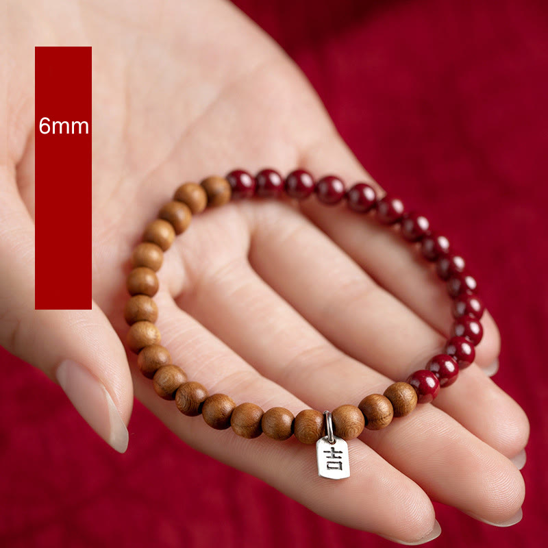 Handmade 925 Sterling Silver Peach Wood and Cinnabar Beaded Stretch Bracelet
