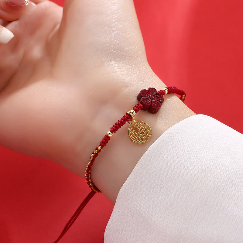 Handmade Red String Cinnabar Flower and Copper Fu Character Braided Bracelet