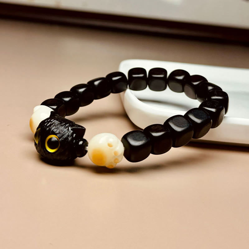 Hand-Carved Ebony Wood and Bodhi Seed Cat Paw Motif Bracelet