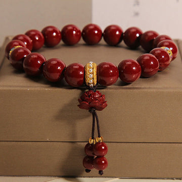 Cinnabar and Pearl Beaded Bracelet with Carved Lotus Charm