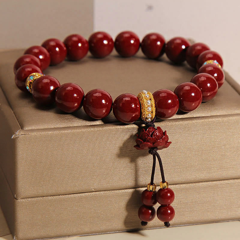 Cinnabar and Pearl Beaded Bracelet with Carved Lotus Charm