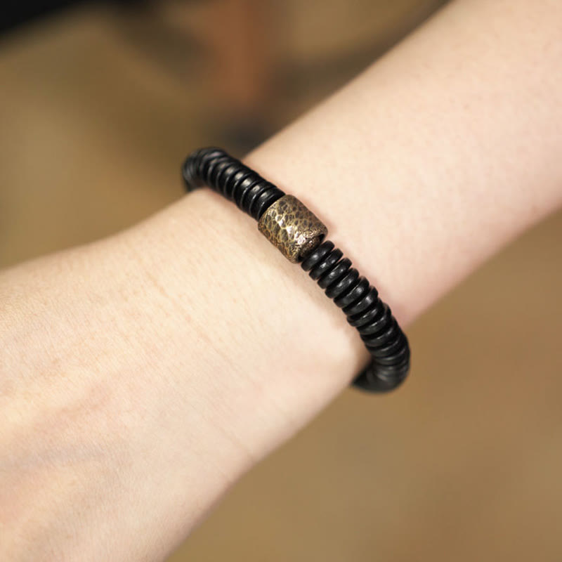 Matte Ebony Wood Roller Bead Bracelet with Brass and Copper Accents