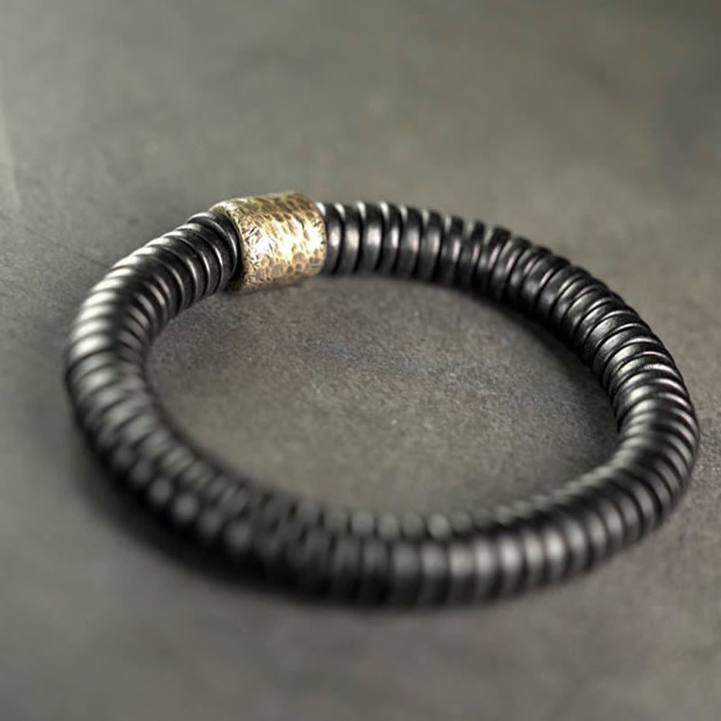 Matte Ebony Wood Roller Bead Bracelet with Brass and Copper Accents