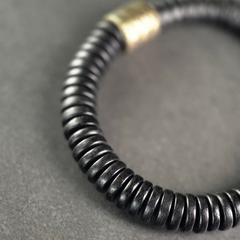 Matte Ebony Wood Roller Bead Bracelet with Brass and Copper Accents