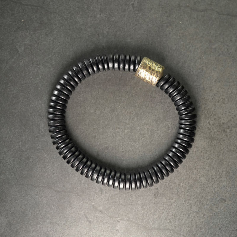 Matte Ebony Wood Roller Bead Bracelet with Brass and Copper Accents
