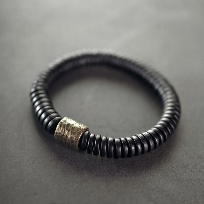 Matte Ebony Wood Roller Bead Bracelet with Brass and Copper Accents