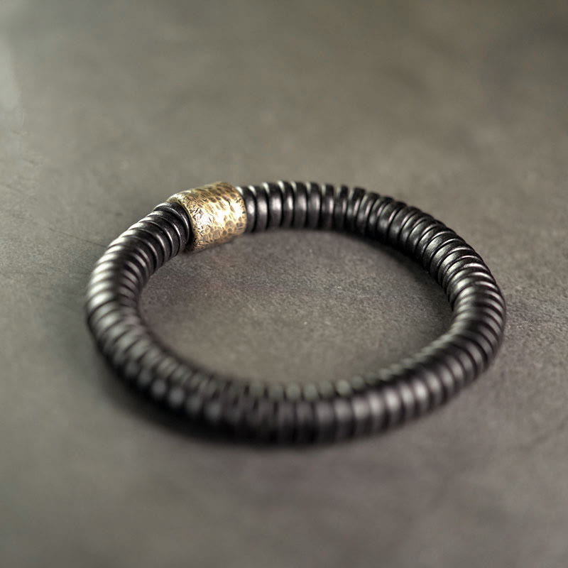 Matte Ebony Wood Roller Bead Bracelet with Brass and Copper Accents