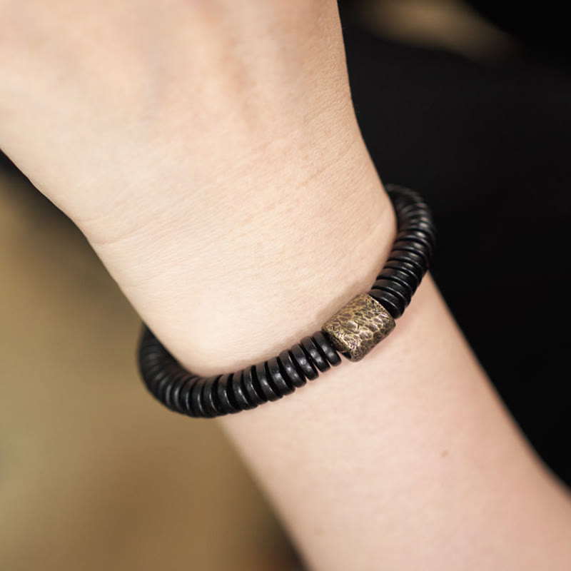 Matte Ebony Wood Roller Bead Bracelet with Brass and Copper Accents