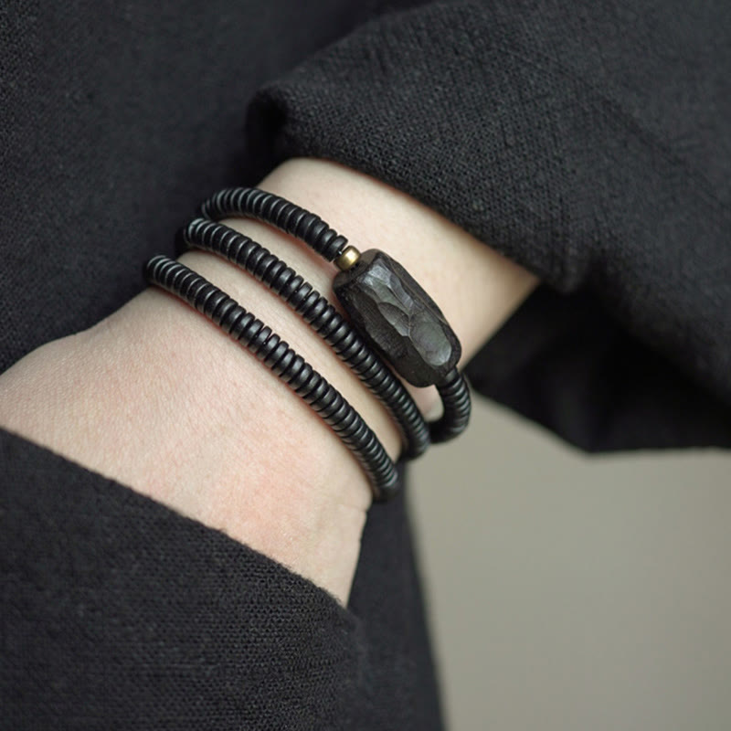 Ebony Wood with Copper and Brass Accents Triple Wrap Roller Bead Bracelet