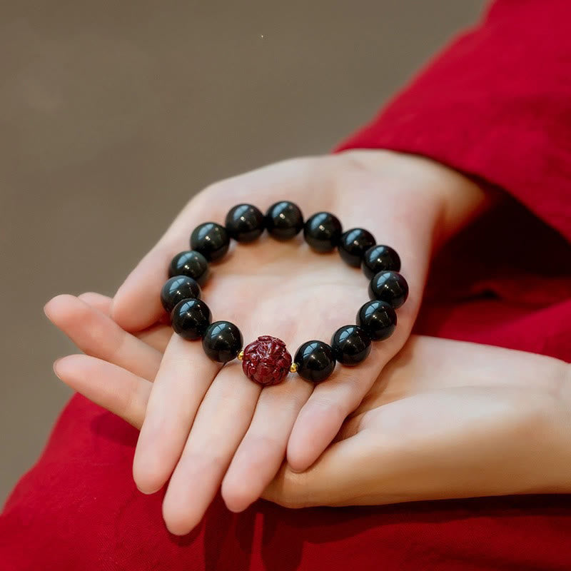 Natural Black Obsidian and Carved Cinnabar Chinese Zodiac Beaded Bracelet
