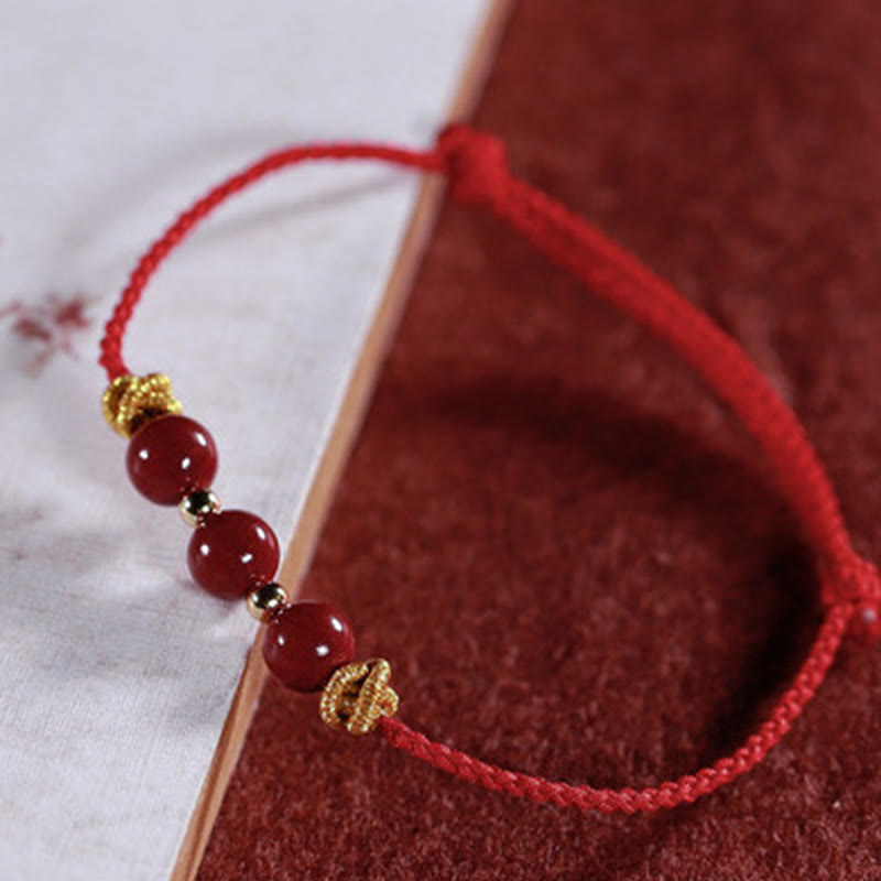 Handcrafted Cinnabar and Copper Braided Red String Bracelet for Vitality