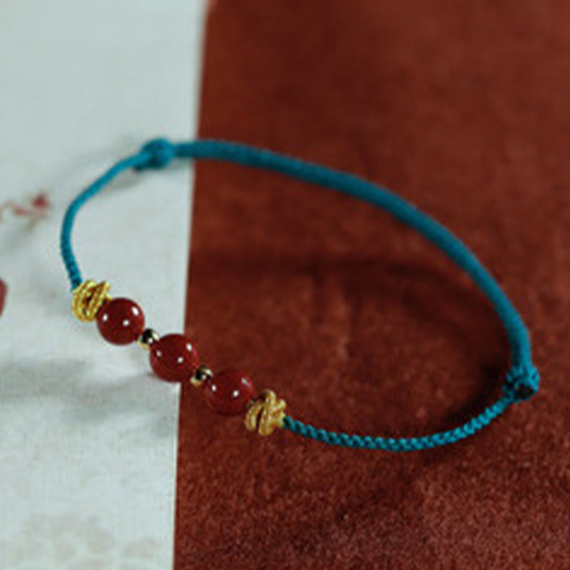 Handcrafted Cinnabar and Copper Braided Red String Bracelet for Vitality