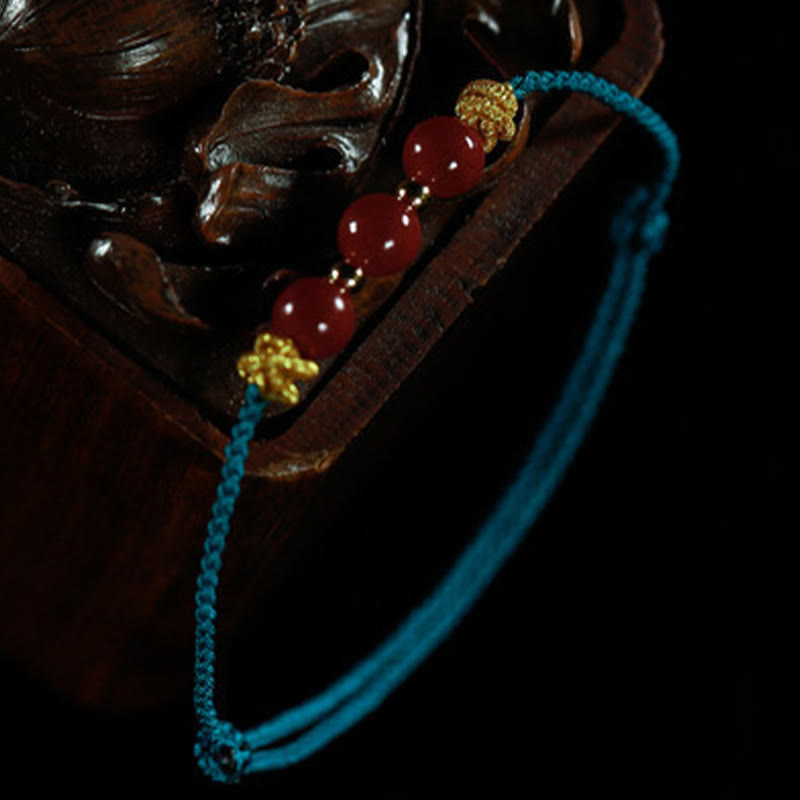 Handcrafted Cinnabar and Copper Braided Red String Bracelet for Vitality