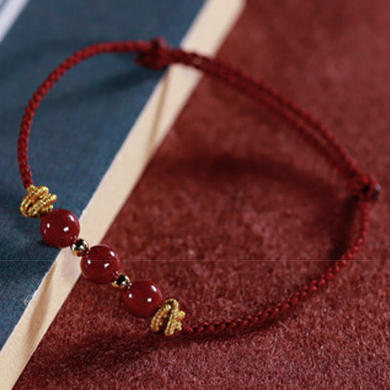 Handcrafted Cinnabar and Copper Braided Red String Bracelet for Vitality