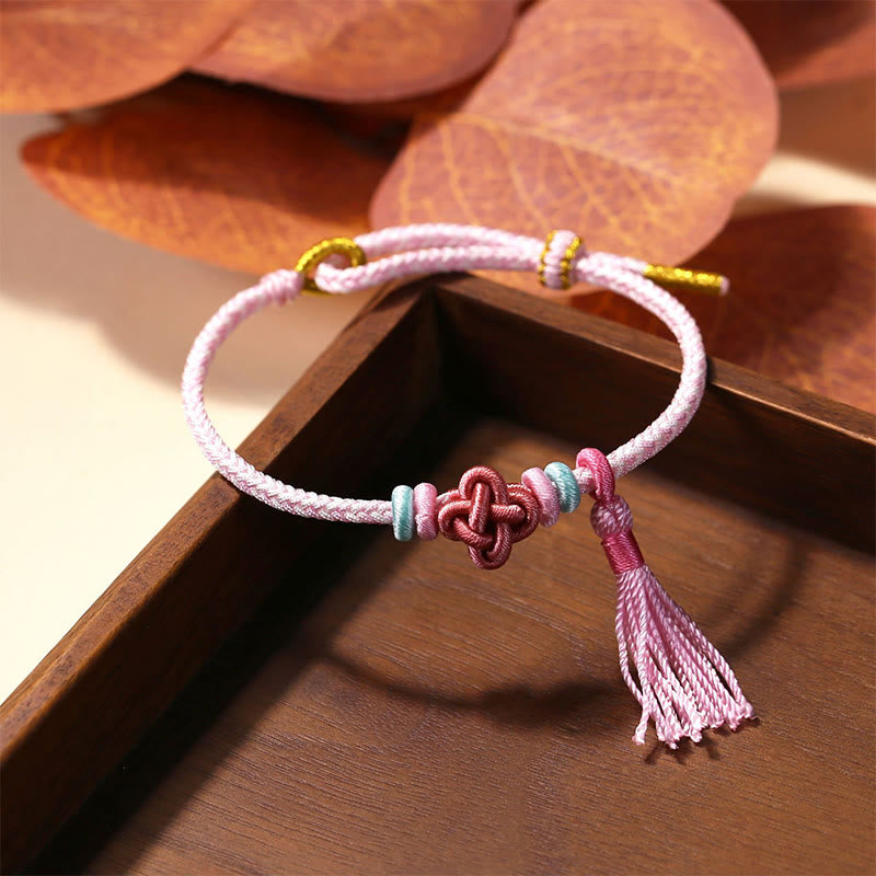 Handmade Endless Knot Tassel Bracelet with Peach Blossom Cord