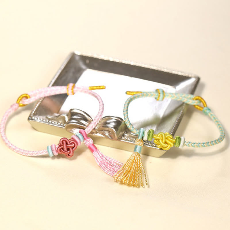 Handmade Endless Knot Tassel Bracelet with Peach Blossom Cord