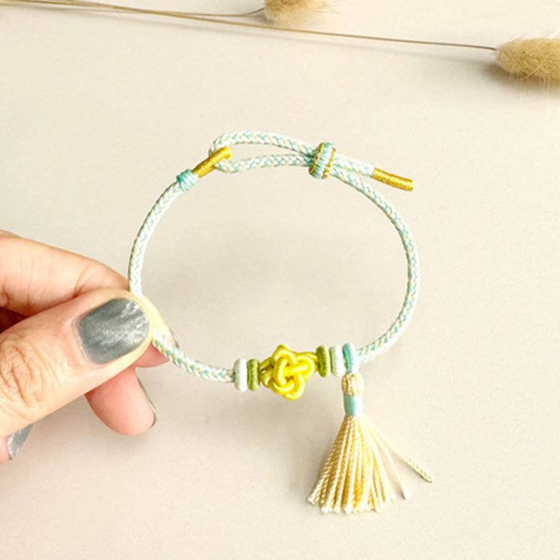 Handmade Endless Knot Tassel Bracelet with Peach Blossom Cord