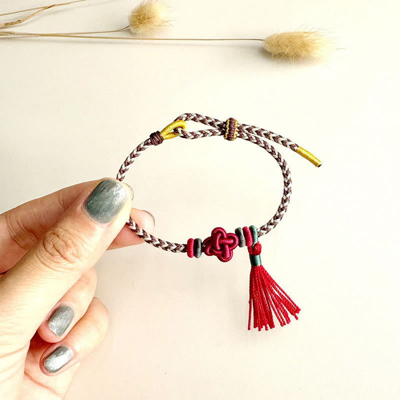 Handmade Endless Knot Tassel Bracelet with Peach Blossom Cord