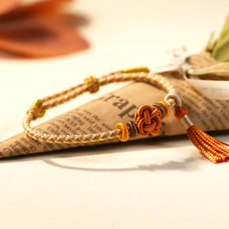 Handmade Endless Knot Tassel Bracelet with Peach Blossom Cord