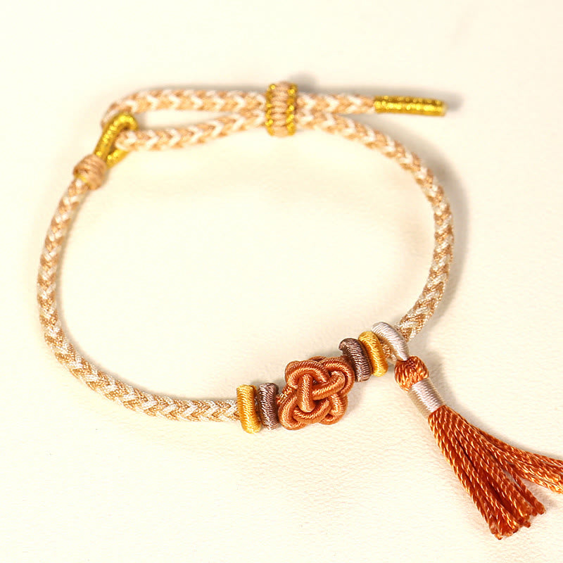 Handmade Endless Knot Tassel Bracelet with Peach Blossom Cord