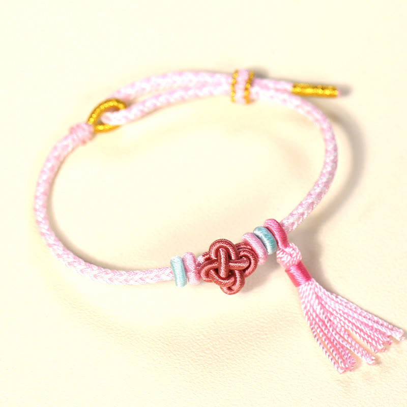 Handmade Endless Knot Tassel Bracelet with Peach Blossom Cord