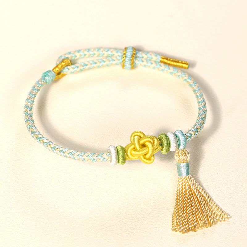 Handmade Endless Knot Tassel Bracelet with Peach Blossom Cord