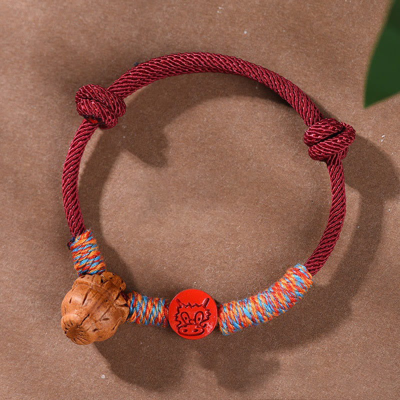 Handmade Chinese Zodiac Red String Peach Pit Cinnabar Luck Bracelet