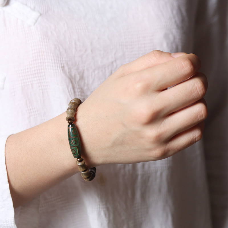 Tibetan Nine-Eye Dzi Bead Green Sandalwood Peace Bracelet