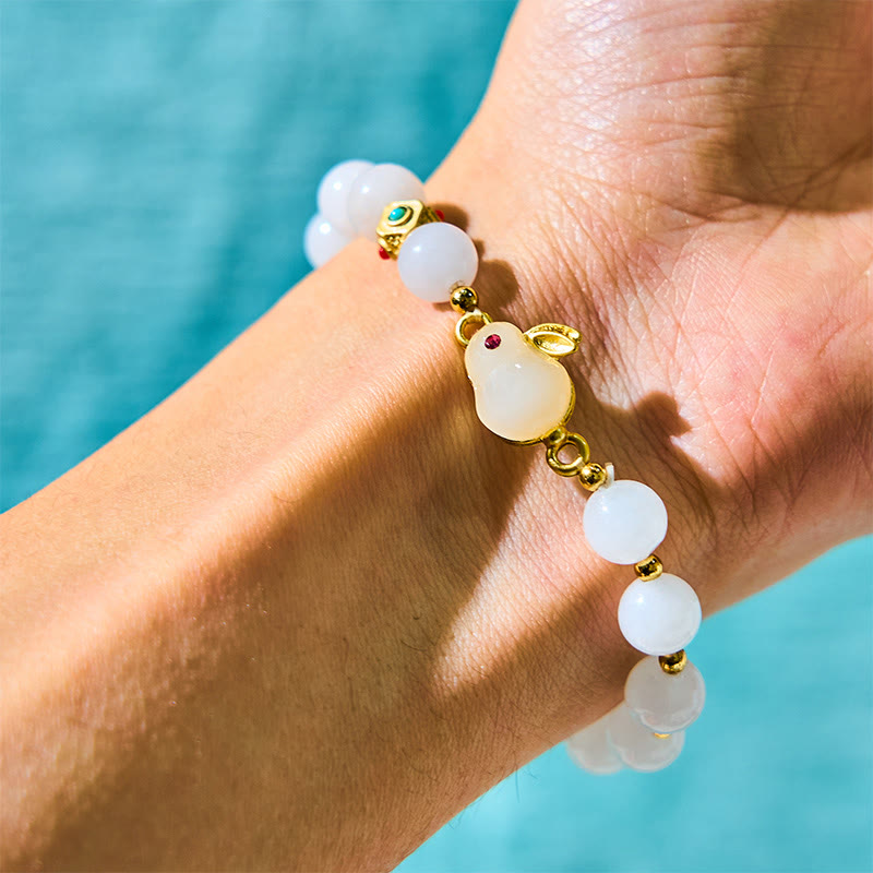 Handcrafted Golden Silk Jade and Copper Rabbit Charm Bracelet