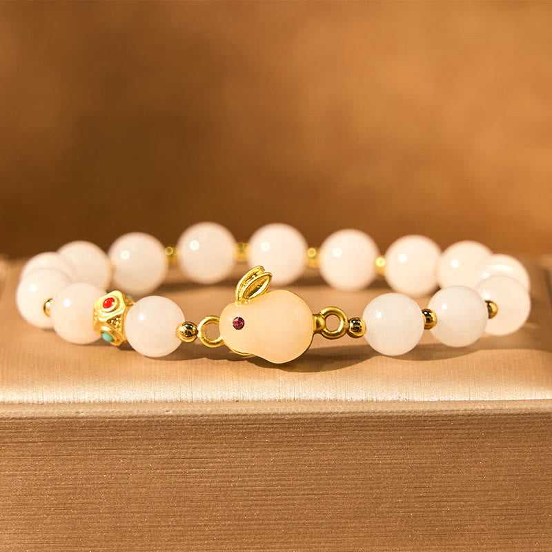 Handcrafted Golden Silk Jade and Copper Rabbit Charm Bracelet