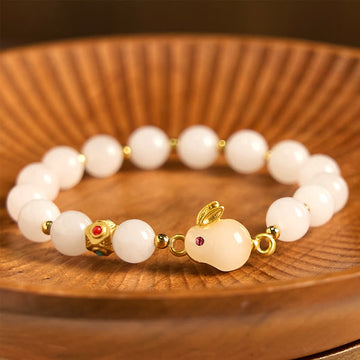 Handcrafted Golden Silk Jade and Copper Rabbit Charm Bracelet