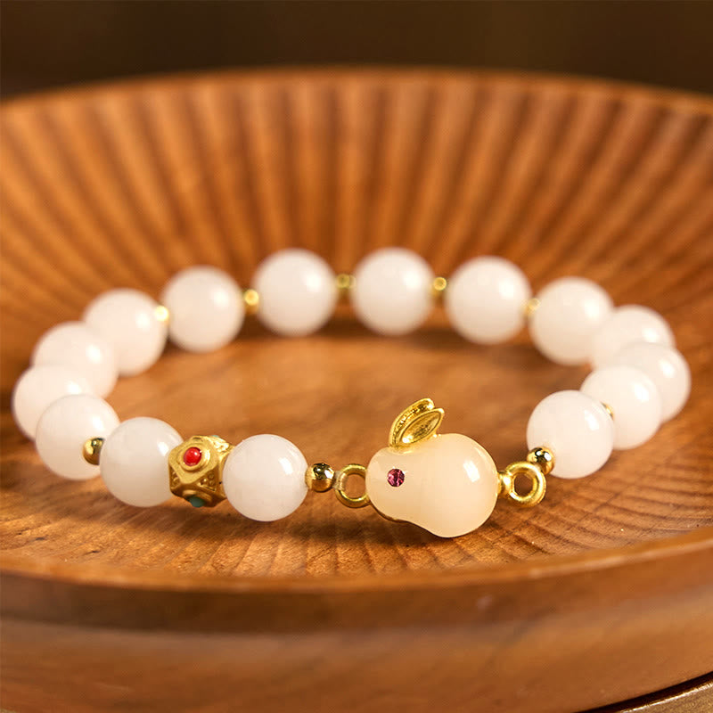 Handcrafted Golden Silk Jade and Copper Rabbit Charm Bracelet