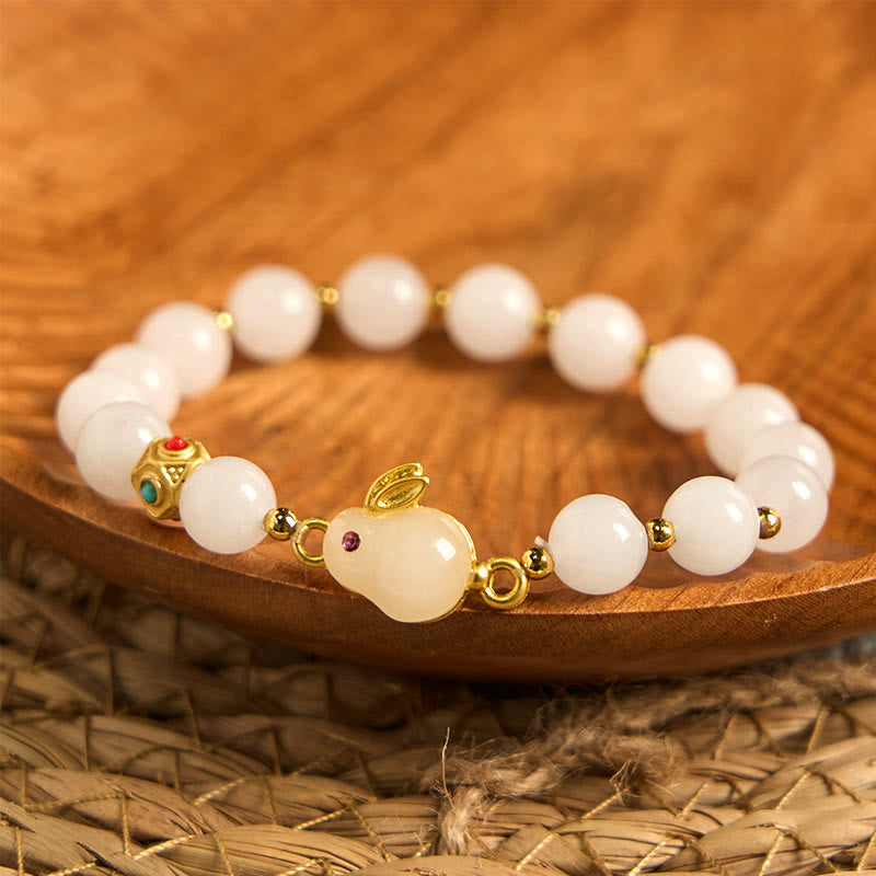 Handcrafted Golden Silk Jade and Copper Rabbit Charm Bracelet