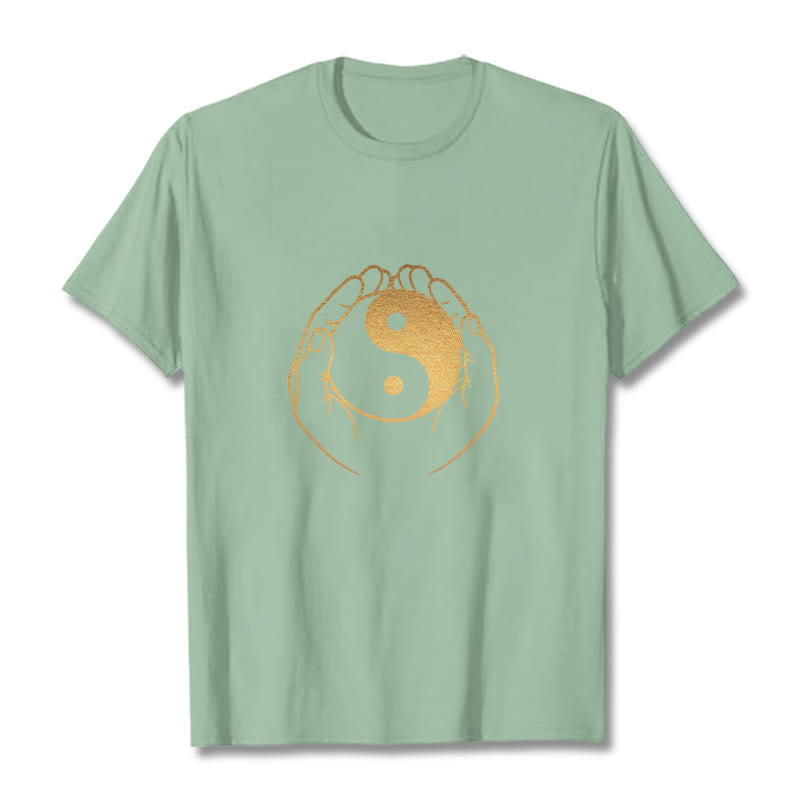Hands Holding A Golden Yin Yang Tee T-shirt