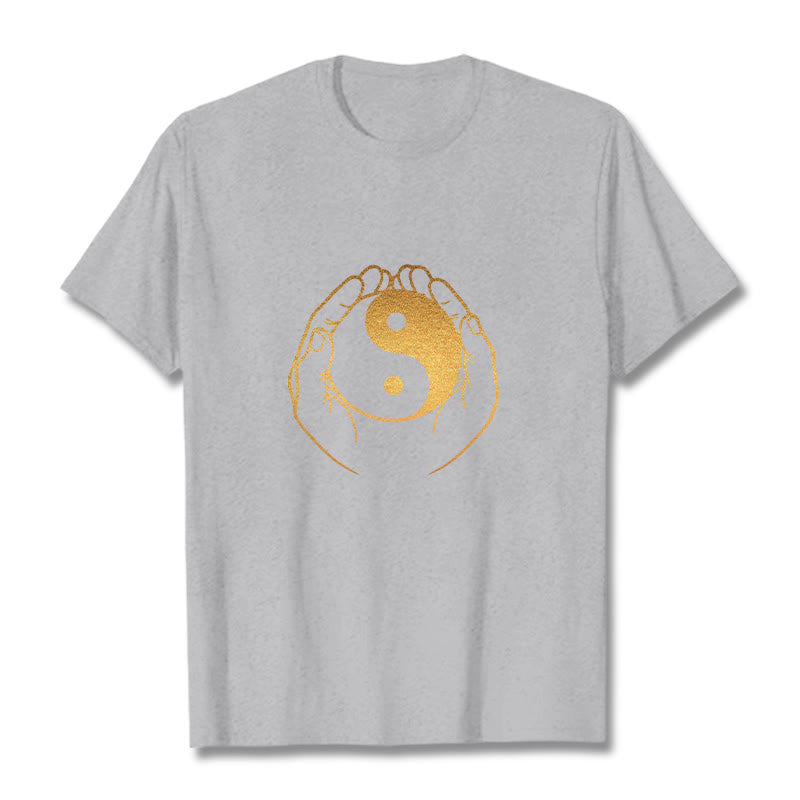 Hands Holding A Golden Yin Yang Tee T-shirt
