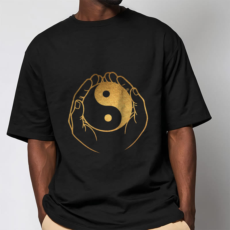 Hands Holding A Golden Yin Yang Tee T-shirt