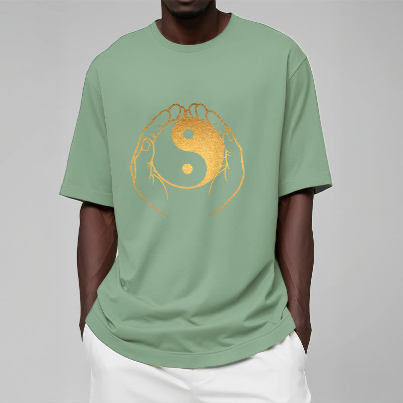 Hands Holding A Golden Yin Yang Tee T-shirt