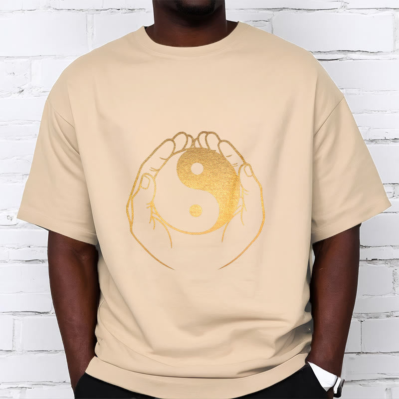 Hands Holding A Golden Yin Yang Tee T-shirt