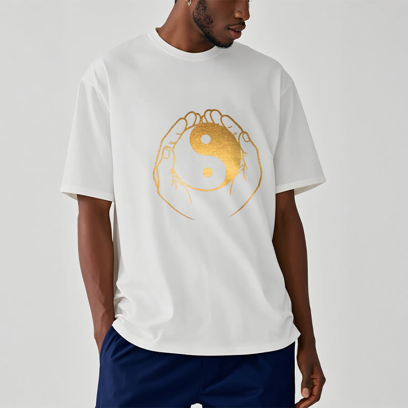 Hands Holding A Golden Yin Yang Tee T-shirt