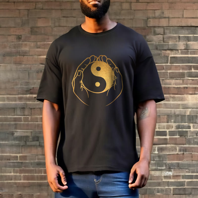 Hands Holding A Golden Yin Yang Tee T-shirt
