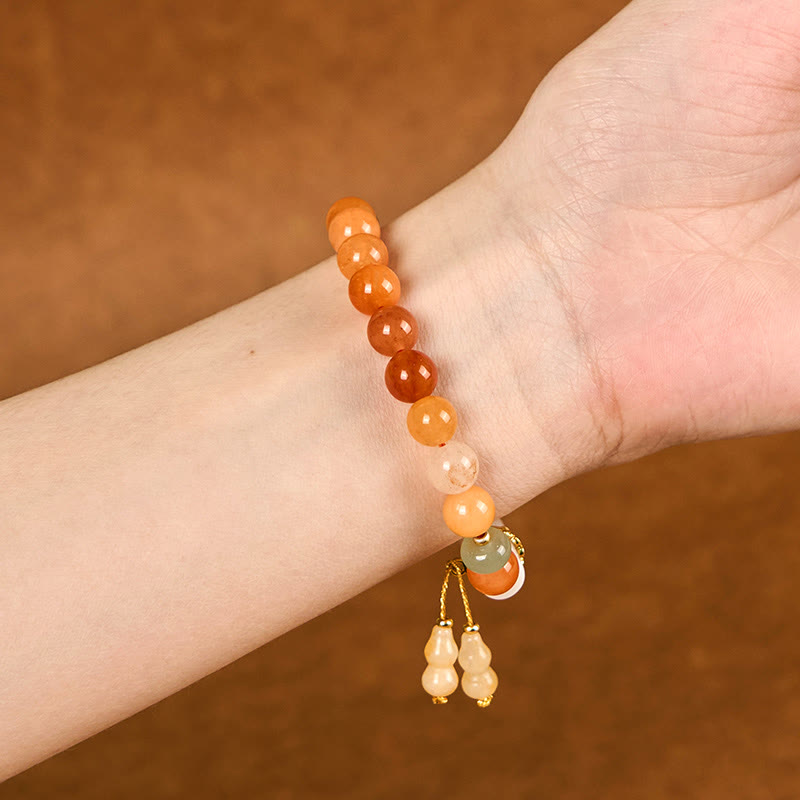 Golden Silk Jade and Clear Quartz Wu Lou Gourd Beaded Bracelet