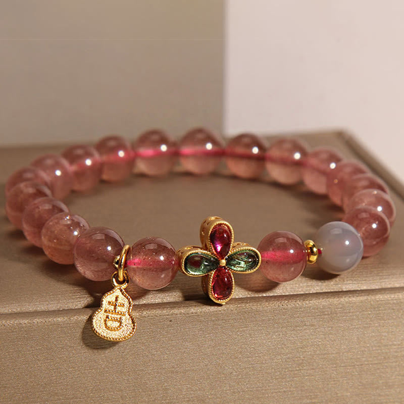Strawberry Quartz Beaded Bracelet with Four-Leaf Clover and Wu Lou Gourd Charms