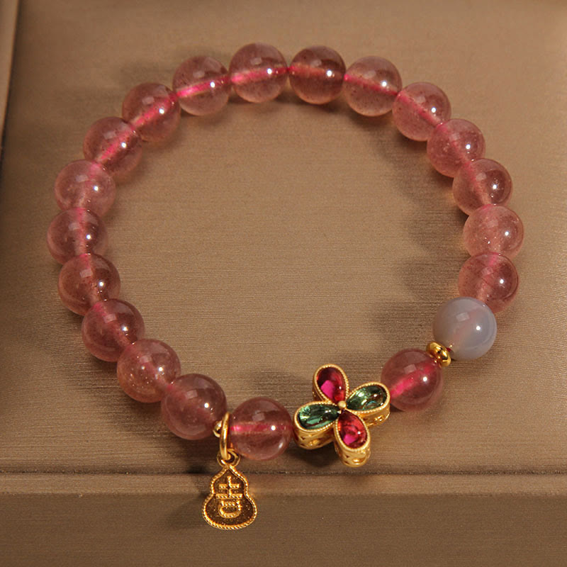 Strawberry Quartz Beaded Bracelet with Four-Leaf Clover and Wu Lou Gourd Charms