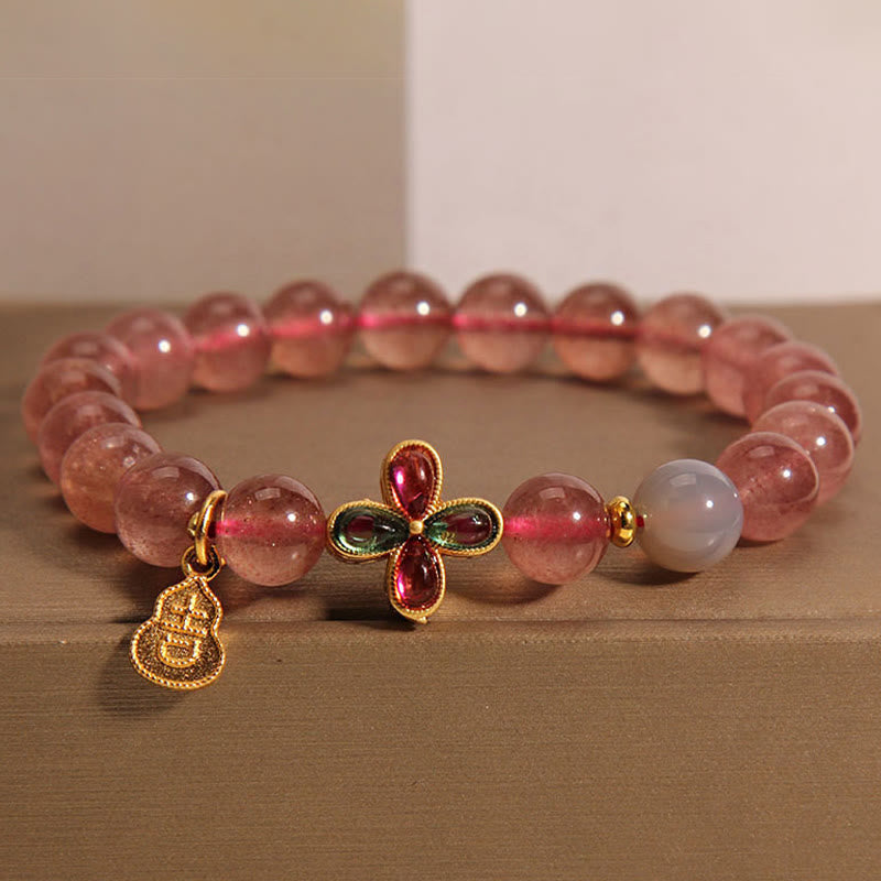 Strawberry Quartz Beaded Bracelet with Four-Leaf Clover and Wu Lou Gourd Charms