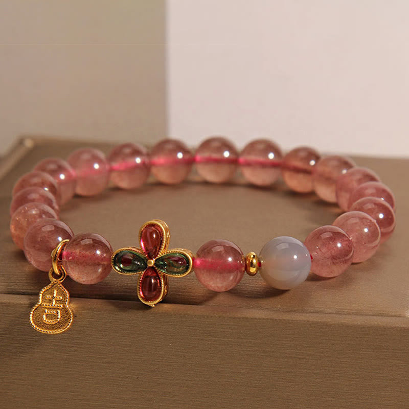 Strawberry Quartz Beaded Bracelet with Four-Leaf Clover and Wu Lou Gourd Charms